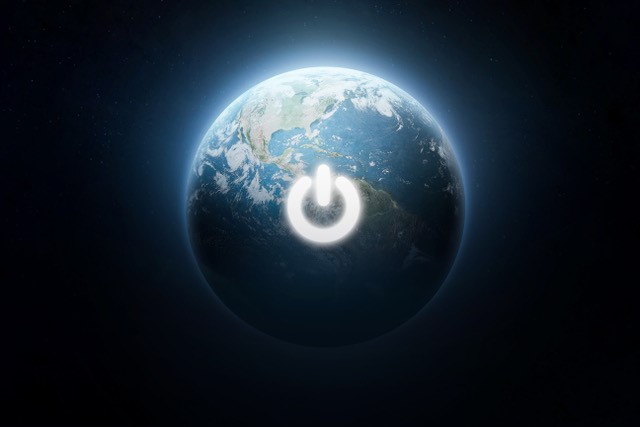 Earth with a power sign in the center of it.