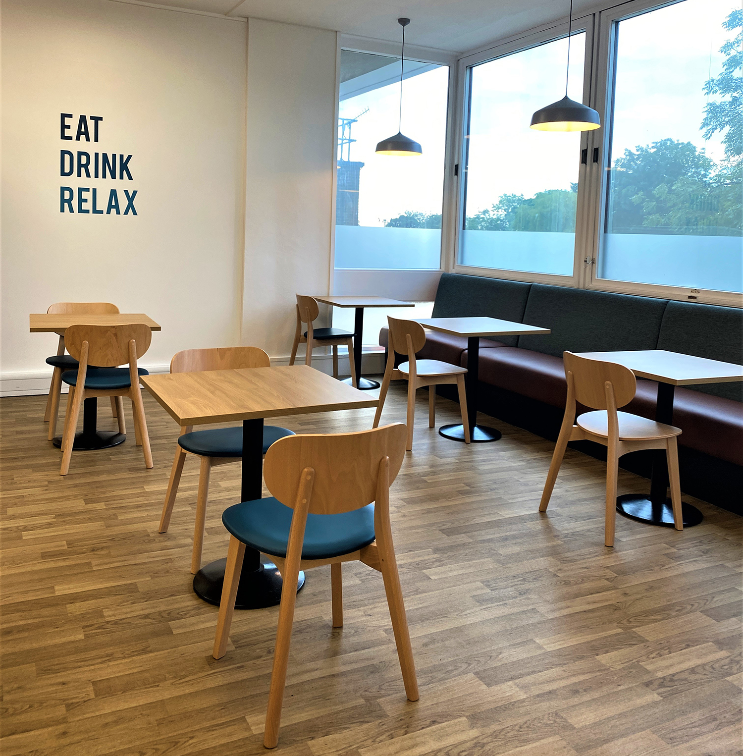 Southside Dining Area with the words EAT, DRINK, RELAX on the wall