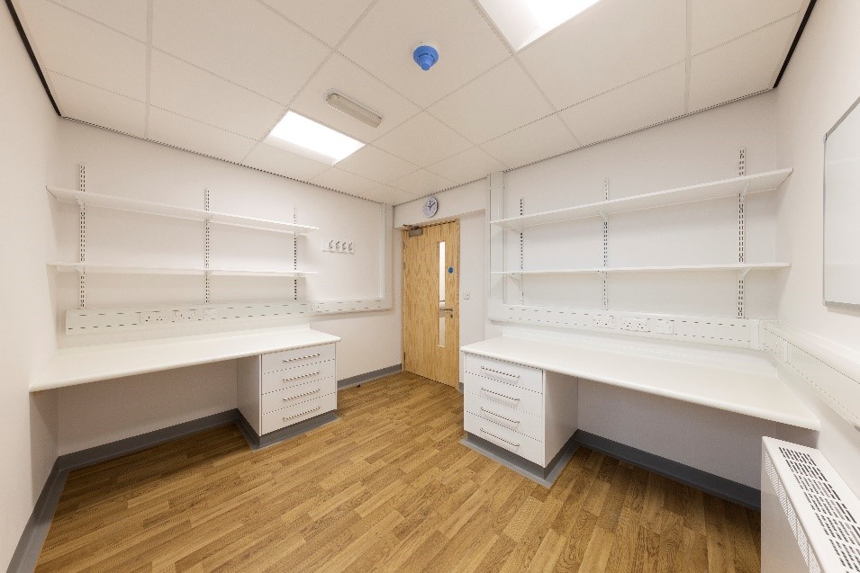 Room with shelves and desks at Ward 18